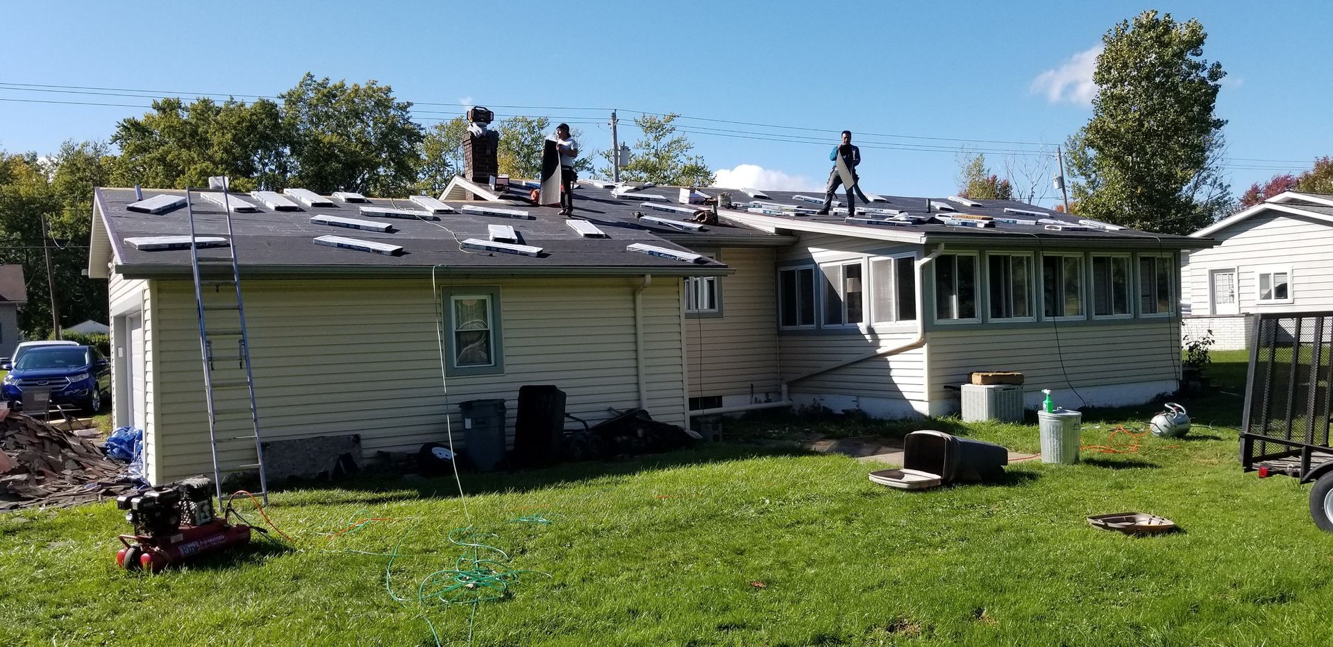 Roof replacement in progress on a home in Akron, Ohio